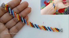 a woman's hand holding a multicolored beaded bracelet