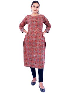 The Kutchi hand block print maroon color Kurti for women having very nicely designed boat neck and both side pockets its length is very perfect to pair with tight bottoms. Its long slits will make you free and comfortable to move. We have designed this kurti to wear as loose garment and stay in the most comfort zone. Its cuffs are twisted with contrast colour printed fabric which make our kurti unique. Can wear indoor outdoor, casual, travel, work , vacation, street wear and daily wear.