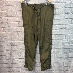 Nwt Men’s Large Uniform Studios Olive Green Snap & Zip Side Cargo Pants. New With Tags. Never Worn. No Holes, Rips, Snags, Stains, Pilling, Peeling, Fading Or Discoloration. Smoke Free & Pet Friendly. Material: Self: 100% Polyester Lining: 94% Rayon, 6% Spandex Measurements Waist:19” Rise:12” Back Rise:15” Inseam:30” Smoke Free & Pet Friendly Questions? Offers? Leave A Comment Below! Military Style Outdoor Trousers, Outdoor Military Trousers, Military Style Long Outdoor Pants, Military Style Outdoor Long Pants, Military Style Long Pants For Outdoor, Green Combat Long Pants, Green Combat Style Long Pants, Military Parachute Pants With Hip Pockets, Combat Style Long Pants For Outdoor