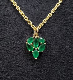 1. Emerald 14k Gold Pendant 2. Made to Order 3. Gemstone - Emerald 4. Jewelry Type - Pendant 5. Total weight - 1.171 Gram Approx 6. Emerald Weight - 1.00 Carats 7. Gold Weight - 0.971 Grams Approx. 8. Emerald Size - Mix 9. Gold Purity - 14k 10. Pendant Bails Size - 5 mm 11. Zambian Emerald 12. Ready to dispatch in 1 - 2 days. 13. Handmade Items 14. AAA Quality Pendant 15. 1 Quantity Available 16. Inclusion based Pictures are taken under natural and day light. Fine Jewelry In 14k Gold With Stones, Fine Jewelry Emerald Pear-shaped Necklace, Elegant Emerald Briolette Necklaces, Briolette Emerald Necklace For Formal Occasions, Formal Emerald Briolette Necklace, Formal Briolette Emerald Necklace, Yellow Gold Gemstones For Anniversary, Elegant Yellow Gold Pear-shaped Gemstones, Elegant Pear-shaped Yellow Gold Gemstones