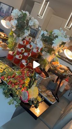 a buffet table filled with lots of food