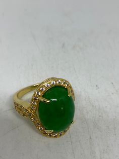 Vintage Lucky Green Nephrite Jade ring Fun jade is color enhanced Large green nephrite jade Ornate German Gold finished Vintage ring, does not tarnish, NOT sterling Size 6, 7, 8, or 8.75 All rings are shipped free in the US in a nice gift box. Check out our over a THOUSAND great reviews!!! Engraving is $4 per letter and is not always perfect depending on the piece. It can take a few days if the jeweler is busy. This is payable to Paypal Judithsltd@gmail.com This is "fun jade" Color enhanced ston Green Emerald Oval Cabochon Ring, Green Emerald Ring With Oval Cabochon, Green Emerald Cabochon Rings, Oval Green Opal Gemstone Ring, Green Cabochon Emerald Ring For May Birthstone, Green Oval Opal Ring For Formal Occasions, Green Chrysoprase Cabochon Rings, Green Cabochon Opal Ring, Formal Green Opal Ring