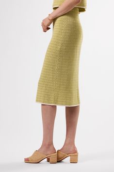 We crafted this versatile skirt in organic cotton crochet, the knit of the season. Layer over a swimsuit or top with a plain white tee; the opportunities are endless.Pull on crochet texture skirt with elastic at waistContrast color detail at hem100% Organic Cotton28" in LengthEthically Made in ChinaPart of a Matching Set Summer Textured Knit Crochet Dress, Textured Knit Crochet Summer Dress, Beach Cotton Skirt With Crochet Trim, Spring Pointelle Knit Skirt, Spring Green Crochet Knit Dress, Green Knit Crochet Dress For Spring, Spring Knit Skirt With Pointelle Details, Pointelle Knit Skirt, Spring Fitted Knitted Skirt