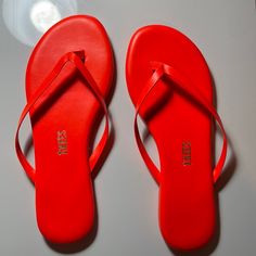 Brand New, Only Tried On. Beautiful Neon Orange Color, Perfect For Summer. Flat Tan Flip Flops For Spring, Tan Flat Flip Flops For Spring, Red Jelly Sandals For Spring Vacation, Red Jelly Sandals For Vacation In Spring, Tan Flip Flops For Spring, Tan Flat Flip Flops For Vacation, Tan Flat Sandals For Beach, Tan Sandals For Beach In Spring, Spring Beach Tan Sandals