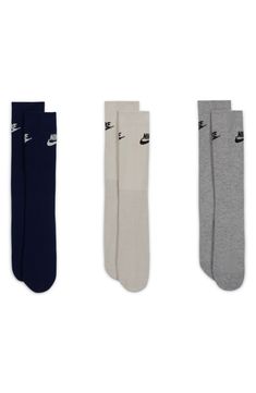 These crew socks are made from soft, stretchy fabric that molds to your foot for all-day comfort. Pack of three assorted pairs Polyester/spandex Machine wash, tumble dry Imported Comfortable Nike Sports Socks, Casual Slip-resistant Gray Socks, Casual Gray Slip-resistant Socks, Nike Sports Socks, Casual Fade-resistant Training Socks, Casual Gray Sports Socks, Comfortable Knee-high Sports Socks, Breathable Casual Knee-high Socks For Sports, Breathable Casual Knee-high Sports Socks