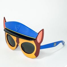 Gear up for adventure with Lil Character Paw Patrol Chase Kids Sunglasses, the ultimate accessory for fans of Paw Patrol's brave police pup! These fun and vibrant sunglasses feature a design inspired by Chase, complete with his signature blue color and police hat details. Perfect for outdoor play, themed parties, or adding a heroic touch to everyday outfits, these sunglasses capture Chase's dedication and courage. With 100% UV protection, they not only enhance your child's style but also ensure Novelty Plastic Sunglasses With Tinted Lenses, Novelty Sunglasses With Tinted Plastic Lenses, Novelty Sunglasses With Tinted Lenses, Skye Paw Patrol Costume, Skye Costume, Marshall Costume, Rubble Paw Patrol, Paw Patrol Chase, Police Hat