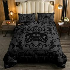 a black and white bed with skulls on it