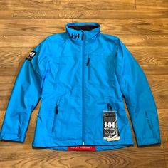 New With Tags Excellent Condition, Stored In Pet/Smoke Free Home. Never Worn Color: Frozen Blue Size: S Polartec Fleece-Lined Dwr Helly Tech Waterproof Protection Bluesign Approved Fabric Hip Length Note: Color Is Slightly More Turquoise To The Eye Than Pictures Show. The Stock Photo At The End Shows More Of The True Color. No Matter What Light We Tried It Came Out The Same Way! It’s A Beautiful Color Though! Frozen Blue, Helly Hansen Jacket, Long Winter Jacket, Black Ski Jacket, Winter Coat Parka, Purple Coat, Ski Girl, Polartec Fleece, Winter Parka