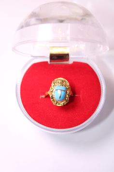 Egyptian Blue Scarab Gold 18K Ring Stamped Charm Pharaonic 2.3 Gr all sizes Weight Approximate : 2.3 Gr All Sizes Available just tell us your Size ✔ IT IS Tested & SIGNED WITH THE EGYPTIAN Gold Government HALLMARK FOR 18K GOLD to Ensure Authenticity. ✔ Lovely gift idea ABSOLUTELY GORGEOUS, LOOKS FABULOUS ON. ✔ 100% Egyptian handmade. ✔ Condition: A brand-new, exactly as on the photos. ★ GIFTS ✔ All items are packaged in a paper jewelry gift box, ready for gifting. ✔ If you are sending a gift Gold Oval Turquoise Ring Gift, Heirloom Style Gold Turquoise Ring As Gift, Oval Gold Turquoise Ring Gift, Heirloom Gold Turquoise Gemstone Ring, Antique Yellow Gold Turquoise Ring Gift, Antique Turquoise Ring In Yellow Gold For Gift, Beetle Ring, Egyptian Beetle, Egyptian Gold