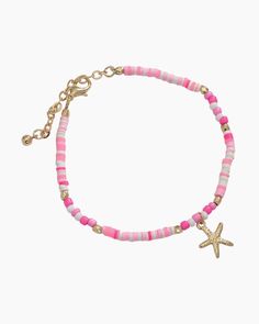 Multicolor pink beaded bracelet with gold starfish charmAdjustable design for the perfect fitLobster claw claspA stylish addition to any fashion jewelry collectionLead and nickel compliant Gold Starfish Bracelet With Starfish Charm, Gold Starfish Beaded Bracelets For Beach, Gold Beaded Bracelets With Starfish Charm As Gift, Adjustable Starfish Charm Bracelet, Star-shaped Colorful Beaded Jewelry For The Beach, Star-shaped Colorful Beads Jewelry For Beach, Pink Starfish Jewelry For Gift, Gold Beaded Charm Bracelet For Beach, Summer Bracelet With Starfish Charm