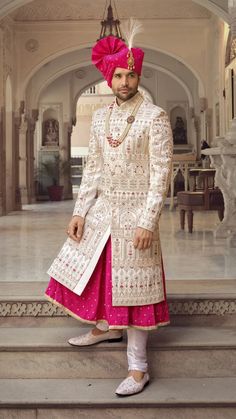 Handcrafted Designer Sherwani for groom made from the finest fabric will make you feel like a king on the happiest & most important day of your life. you can customize it according to your measurement as the fitting make it more beautiful to wear. COST INCLUDES SHERWANI,PANTS & STOLE(Dupatta) White Straight Kurta Bandhgala For Wedding, White Long Sleeve Sherwani For Diwali, Semi-stitched White Nehru Jacket For Wedding, Fitted White Sherwani With Cutdana, Fitted White Sherwani With Cutdana Details, Ceremonial White Traditional Wear With Naqshi, White Naqshi Traditional Wear For Ceremonial Occasions, Ceremonial White Naqshi Traditional Wear, White Sherwani For Eid Festivities