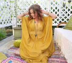 Vintage Rare 1960s 1970s Alfred Shaheen Gold Goddess Chic Kaftan Maxi Dress.  This Designer Dress Is Out Of This World!😍 Shimmery, Flattering And Flowy Gold Lurex.  Size Adjusts To Fit Small, Medium And Large.  Zips in back. Ties inside For Perfect Fit. Angel Sleeves. Beautiful Embroidered V Neckline And Empire Waist.  Words Just Don't Describe How Stunning And Chic This Dress Is. ✨🌙 Measurements: Shoulder-17 in Sleeve-16 in Length-53 in FREE SHIPPING IN USA 🇺🇸 Alfred Shaheen, Gold Goddess, Angel Sleeves, Kaftan Maxi Dress, Angel Sleeve, Designer Dress, Dress Clothes For Women, Empire Waist, Vintage Gold