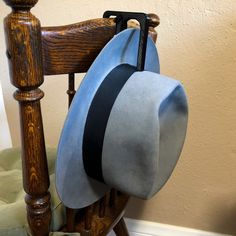 This is the Medium PortaFedora Portable Hat Hook.   It will hold hats with a brim width from 1" to 3 1/8".  It's 3d printed from Taulman's 648 Nylon.   It will securely hold your hat from many different locations.  You can use the large inside space to hook around a handle or backpack loop, or the smaller hook at the top for chairs, the leather (normally suede pig skin but calf leather can be used if requested) lanyard for chairs posts, or the lanyard and the hook for cars (head rest post).   It only weighs less than an ounce.   Its flexible and durable.  The dimentions are 3/8" thick X 4" tall X 4 1/4" wide.  Fits in a pocket. A great gift for any Hat lover or Hat owner.  Great Christmas or Birthday present. Adjustable Short Brim Top Hat, Gray Adjustable Flat Brim Fedora, Adjustable Gray Wide Brim Hat Bands, Gray Wide Brim Hat With Adjustable Fit, Gray Wide Brim Adjustable Hat, Vintage Gray Hat, One Size, Vintage Gray Hat, One Size Fits Most, Adjustable Gray Brimmed Hat, Gray Adjustable Hat With Short Brim