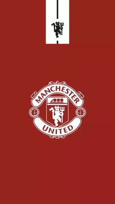 the manchester united logo on a red background