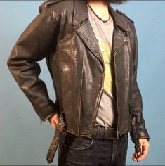 "Vintage 90's black leather motorcycle jacket designed by Polarpels, Norway Snap down collar, lapels and shoulder epaulets Traditional zippered sleeve cuffs Attached half belt with heavyweight nickel plated square buckle Three outside zippered pockets plus small functional coin flap pocket One interior pocket Fixed nylon insulated lining Jacket exterior is in great condition with minimal wear (one snap on left collar broken) Jacket interior is in great condition Labels are intact Name on label - Leather Biker Jacket For Alternative Fashion, Fitted Leather Biker Jacket For Alternative Fashion, Biker Style Leather Outerwear For Alternative Fashion, Biker Jacket With Belt Loops, Biker Jacket With Belt Loops For Biker Events, Long Sleeve Biker Jacket With Belt Loops, Winter Biker Jacket With Belt Loops, Vintage Black Biker Jacket For Alternative Fashion, Black Leather Motorcycle Jacket