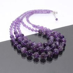 PRODUCT DETAIL :ITEM : PURPLE AMETHYST BEADED NECKLACEITEM CODE :  DGC3037ITEM NAME :NECKLACEGEMSTONE :  PURPLE AMETHYSTBEADS SHAPE : SMOOTH ROUNDLENGTH :   17"-19" INCH APPROXBEADS SIZE:  3mm/6-12 MM ApproxWEIGHT :  431 Cts. APPROXCUSTOMIZATION/BULK ORDER : AVAILABLEPLEASE FEEL FREE TO CONTACT IF YOU REQUIRE ANY FURTHER INFORMATION. Luxury Briolette Beaded Necklace With Polished Beads, Cheap Lavender Beaded Necklaces For Gifts, Cheap Oval Gemstone Beads Necklaces, Luxury Oval Beads Beaded Necklace For Gift, Purple Faceted Round Beads, Purple Round Faceted Beads, Adjustable Amethyst Round Bead Gemstones, Purple Crystal Necklaces With Faceted Beads For Healing, Amethyst Round Beads Gemstones For Healing