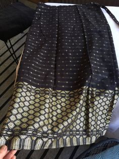 Exotic Black and Gold silk wrap-around skirt, darted for a slim fit (as shown in the last photos). The skirt wraps around and ties the waist. The width of the entire skirt flat is about 61" around, and you can adjust how slim you want it by overlapping more or less of it and using the waist ties to tighten to your size. It's about 31" from waist to hem. Please take a look at my storefront at: https://www.etsy.com/shop/FabFinds42?ref=seller-platform-mcnav I have a wide selection of one-of-a-kind Wrap Skirt Black, Alien Clothes, Black Wrap Skirt, Shiny Skirts, Long Wrap Skirt, Gold Skirt, Retro Skirt, Pink Summer Dress, Pink Dress Casual