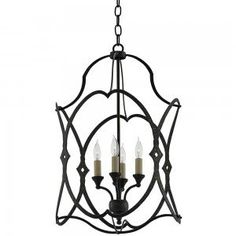 an iron chandelier with four candles hanging from the center, on a white background