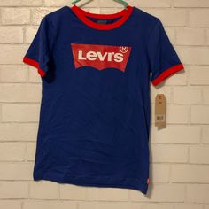 New Levis Blue Ringer Tee With Red Trim Blue Graphic Print Shirt For School, Blue Letter Print Top For School, Blue Letter Print Tops For School, Blue Letter Print Shirt For School, Casual Blue Levi's Shirt, Levi's Blue Crew Neck Tops, Levi's Blue Cotton Shirt, Levis T Shirt, Levis Shirt