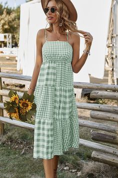 Our Margaretta Dress comes in a pistachio and mint checkered print. This features a singlet style, sleeveless with frill details, an elastic bodice, and a flowy skirt. The relaxed fit mid pairs beautifully with our heels or sandals for a fun casual look! Size Guide: Esmée is 5’7” tall, and has a 34.5” bust, 26.22” waist, & 34.6” hips. She is wearing a S / US 4 / AU 8. This dress is true to size. Material: 50% Viscose, 50% Polyester. Feature: Midi length. Elastic shirred bodice. Sleeveless with f Plaid Summer Dress, Boho Plaid, Plaid Dress Vintage, Sundress Casual, Backless Midi Dress, Sling Dress, Gingham Dress, Polyester Dress, Boho Casual