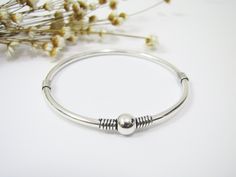 Simple but chic sterling silver bangle for everyday dress up; Brand: ANKA; Metal: good quality solid 925 sterling silver; "925" stamped; Measurement: 60mm with open closure; Colour as shown; In Gift Box Packing; Cleaning and polishing with sterling silver cloth after wear We have more silver items and amber collection at our Etsy shop: https://www.etsy.com/shop/CharmPlus Silver Nickel-free Bangle, Unique Nickel-free Silver Bangle, Antique Silver Nickel-free Bangle Bracelet, Nickel-free Silver Bangle Charm Bracelet, Vintage Sterling Silver Nickel-free Bangle, Bangle Silver, Everyday Dress, Silver Items, Box Packing