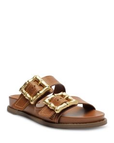 Schutz Women's Enola Sporty Slip On Buckled Slide Sandals Designer Open Toe Sandals With Gold Buckle, Designer Brown Sandals With Tang Buckle, Designer Leather Sandals With Gold Buckle, Summer Sandals With Gold-tone Hardware And Round Toe, Summer Sandals With Gold-tone Hardware, Brown Sandals With Brass Buckle, Designer Sandals With Gold-tone Hardware And Round Toe, Teal Flats, Orange Sandals