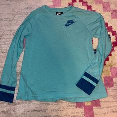 Nike Long Sleeve, Washed But Never Worn. Youth Large Or Ladies Small. Jersey Material At The Wrists. Xposted. Nike Long Sleeve T-shirt For Spring, Sporty Long Sleeve Playwear Top, Light Blue Sporty Tops For Fall, Sporty Long Sleeve Tops For Playwear, Nike Sporty Tops For Playwear, Sporty Nike Top For Playwear, Light Blue Casual Tops For Playwear, Trendy Blue Long Sleeve T-shirt, Blue Long Sleeve Trendy T-shirt