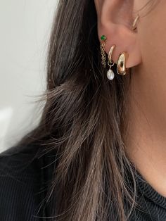 A pair of our signature everyday hoops with two matching tiny freshwater pearl charms — an instant classic. Hoop Charms, Minimal Earrings, Gold Bond, Gold Filled Hoops, Accessories Brand, Jewelry Essentials, Handmade Jewelry Designs, Pearl Charms, Timeless Accessories