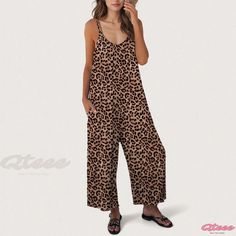 Qteee - Chic Sleeveless Jumpsuit with Leopard Print and Convenient Pockets, featuring Loose Fit and Adjustable Straps Sleeveless Cotton Jumpsuits And Rompers For Leisure, Sleeveless Cotton Jumpsuit For Leisure, Summer Jumpsuits And Rompers For Leisure, Sleeveless Jumpsuits And Rompers For Leisure, Casual Stretch Sleeveless Jumpsuits And Rompers, Casual Sleeveless Stretch Jumpsuits And Rompers, Casual Stretch Jumpsuits And Rompers For Vacation, Brown Summer Jumpsuits And Rompers For Loungewear, Summer Brown Jumpsuits And Rompers For Loungewear