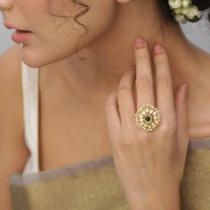 Description: This ring from the Tarinika Kundan collection is a perfect accessory for weddings and festivals. Encrusted with sparkling Kundan stones and pearls, this ring is the epitome of perfection. Accentuate it with other Kundan jewelry and a gorgeous ethnic outfit to complete the look. Details & Specifications: Materials used: Brass Alloy with Matte Gold Plating Weight - Finger Ring 9 gm, Length - Finger Ring 3 cm, Make it custom Want to make it a custom Finger Ring? Sure! Reach out to us a Kundan Rings, Kundan Ring, Kundan Jewelry, Choker Pendant, Kundan Earrings, Kids Necklace, Cz Earrings, Kundan Jewellery, Enamel Earrings