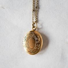 Personalize our popular Locket Necklaces with hand stamping on the inside! Lockets on 18" gold or silver plated satellite chain. Add on a small accent/birthstone for an additional $5 here: https://bit.ly/BVJBirthstoneAddOn Please tell us what you would like stamped on the charms in the "Notes" section at check out. Handcrafted in Little Rock, Arkansas Our images are the best representation of our designs and there may be some variation in your shipment due to the handmade nature of our products. Yellow Gold 14k Stamped Pendant Locket Necklace, Victorian Locket Necklace Stamped 14k, Antique 14k Stamped Locket Necklace Collectible, Vintage Stamped Pendant Locket Necklace, Engraved Silver-colored Brass Locket Necklace, Round Necklace, Hand Stamped Jewelry, Stamped Jewelry, Brass Jewelry