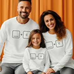 "Get ready to match in style with our Control C Control V Sweatshirt! Perfect for Father's Day or any day, these Family Matching Hoodies bring humor and unity. Embrace the fun with our Funny Family Matching design, available in sizes for Daddy and Me. Stay cozy and coordinated with this Ctrl C Ctrl V Sweater!" Welcome to NIOBE BOUTIQUE. I am happy to see you in my shop. My main purpose is to meet you with a high-quality product. I use the best product to make you happy. Your satisfaction is my p Funny Long Sleeve Cotton Hoodie, White Long Sleeve Matching T-shirt, Family Matching White Long Sleeve Sweatshirt, White Long Sleeve Family Matching Sweatshirt, White Long Sleeve Sweatshirt For Family Matching, Family Matching Long Sleeve Hoodie With Letter Print, White Relaxed Fit Sweatshirt For Family Matching, Funny White Long Sleeve Tops, Funny Cotton Sweatshirt For Winter