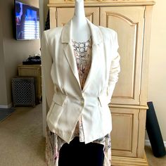 Madison Marcus Ivory Silk Blazer Jacket Never Worn Excellent Condition Not Sold With Belt And Actual Belt Is Missing Price Reflects This Fact Please See Pictures For All The Details This Jacket Has So Many Bells And Whistles. It’s Just Really Fun And Cute. Great For The Office Drinks Afterwards Running Errands. I Bought This Jacket At Bloomingdale’s In Sherman Oaks California. It Has Hung In My Closet Ever Since Shortly After Buying It I Had My Fifth Back Surgery And After I Was Told I Could Not Elegant Cream Blazer For Fall, Chic Beige Spring Blazer, Chic Fitted Cream Outerwear, Beige Formal Blazer For Spring, Elegant Off-white Workwear Blazer, Elegant Off-white Blazer For Work, Chic Beige Blazer For Brunch, Elegant Off White Blazer For Work, Cream Notch Lapel Outerwear For Spring