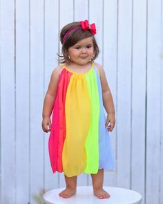 Panels of rainbow colors add a fun flair to this twirl-worthy shift dress. 100% polyester skirt We recommend hand washing and hang drying this article of clothing. Multicolor Sundress For Party, Multicolor Summer Sundress For Party, Summer Rainbow Dress For Dress-up, Rainbow Dress For Summer Dress-up, Rainbow Dresses For Summer Dress-up, Rainbow Summer Dress For Playtime, Rainbow Summer Dresses For Playtime, Rainbow Sleeveless Dress For Summer, Summer Rainbow Playtime Dress