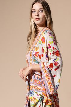 Get festival-ready with our vibrant lightweight duster kimono. Bursting with green, yellow, and purple hues in an intricate geometric print, this kimono is a bold statement piece for any music festival. Each detail meticulously arranged for maximum visual impact. Whether you're dancing in the crowd or chilling in the sun, this kimono exudes elegance and style, making it the perfect addition to your festival wardrobe. *100% Viscose*APPROX. L 52" W 37" Duster Kimono, Floral Duster, Yellow And Purple, Kimono Dress, Purple Hues, British Indian, Geometric Print, Green Yellow, Music Festival