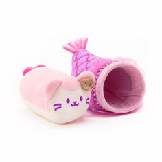 a pink toy with a cat inside of it