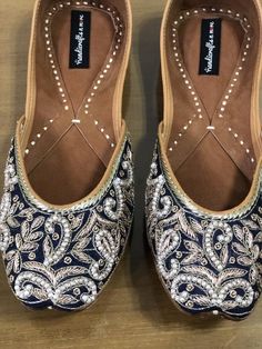 Extremely beautiful Blue fabric jutti with white beads and zardosi work. This jutti is truly a stunner and love at first site. *Ethnic Shoes/Women Flats/Handmade Indian Designer Women Shoes or Slippers/Royal shoes/traditional style WomenIf you are looking for White color you can order from herehttps://www.etsy.com/in-en/listing/1008829009/white-beaded-bridal-shoes-white-womenIf you are looking for rose gold color you can find it herehttps://www.etsy.com/in-en/listing/667080771/rose-gold-beaded-b Festive Mirror Work Closed Toe Flats, Festive Ankle-length Flats For Diwali, Festive Handwork Slip-on Flats, Bollywood Style Meenakari Slip-on Flats, Bollywood Meenakari Slip-on Flats, Festive Flats With Zari Work, Festive Flats With Dori Work, Festive Ankle-length Flats With Dori Work, Festive Bollywood Flats