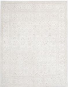 a white rug with an intricate design on it