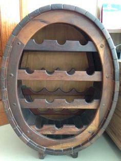 a wine rack made out of an old barrel