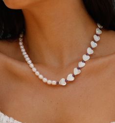 Elegant White Beaded Necklace With Heart Charm, White Pearl Drop Necklace For Valentine's Day, White Pearl Heart-shaped Beaded Necklaces, White Pearl Heart-shaped Beaded Necklace, White Beaded Heart-shaped Pearl Necklace, White Heart-shaped Pearl Beaded Necklace, White Pearl Chain Heart Necklace, Heart-shaped Pearl Beaded Necklace For Valentine's Day, Purple Pearl Single Strand Jewelry