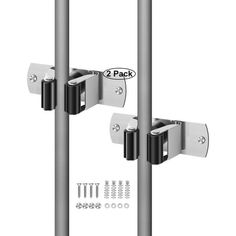 two metal poles with brackets and screws on them