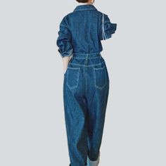 Be transported back to the Pre-millennium with our 2023 Spring-Summer Collection medium wash baggy denim overall! A timeless classic with modern day flair. this one-of-a-kind piece will have you feeling nostalgic and looking fashionably hip. Crafted from luxe denim and featuring a bold buttoned closure. this overall exudes retro chic sophistication.Distinctive Features: 90s Style: Relive the 90s in style with this classic denim overall. Medium Wash: A timeless wash that adds a touch of effortles Baggy Blue Straight Leg Overalls, Blue Baggy Straight Leg Overalls, Summer Utility Style Straight Leg Jumpsuits And Rompers, High Waist Denim Blue Overalls With Pockets, Utility Style Denim Blue Straight Leg Jumpsuit, High-waist Denim Utility Jumpsuit, High-waisted Denim Utility Jumpsuit Or Romper, High Rise Dark Wash Jumpsuits With Pockets, Casual Dark Wash Wide Leg Denim Jumpsuit