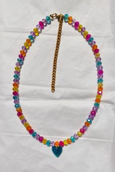 ☙ This transparent colorful crystal beaded necklace, that looks like eatable candies, is all you need to achieve this back in the 90s nostalgia style. It is lightweight and comfortable to wear everyday with your casual outfits to add a playful touch. You can offer it to your friends, kids and partners as a birthday gift or their school year start gift etc. ❧ The necklace has extended chain to fit up to 45 cm ≈ 18 inches length https://www.etsy.com/shop/LeChatAccessories Adjustable Rainbow Crystal Necklace With Faceted Beads, Trendy Handmade Crystal Necklaces, Colorful Beads Rave Festival Jewelry, Y2k Adjustable Beaded Necklaces, Colorful Beaded Rave Jewelry For Festivals, Rave Style Colorful Beads Jewelry For Festivals, Rave Festival Jewelry With Colorful Beads, Adjustable Multicolor Rave Choker, Colorful Beaded Rave Jewelry