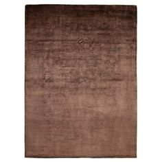 a brown rug on a white background