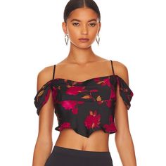 100% Polyester Made In Vietnam Machine Wash Off The Shoulder Styling Adjustable Shoulder Straps Smocked Back Panel Lightweight Satin Fabric With Floral Design And Curved Hem Floral Print V-neck Top For Evening, Summer Evening Crop Top, Red Off-shoulder Top For Evening, Off-shoulder Floral Print Party Blouse, Off-shoulder Floral Print Party Tops, Floral Print Summer Tops For Night Out, Fitted Floral Print Blouse For Night Out, Flirty Summer Evening Tops, Chic Floral Print Crop Top For Party