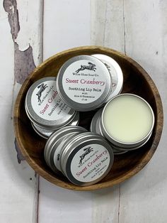 Tart, sweet classic cranberry. Not too soft. Not too waxy. Not sticky, slick, or grainy, Wilde Hare's Soothing Lip balm features a host of lip-loving ingredients including cocoa butter, avocado, sunflower and grapeseed oils, aloe, chamomile, and vitamin e that will leave lips feeling moisturized and nourished. Each screw-top tin features 0.5 oz of our proprietary lipbalm blended with just the right amount of tasty flavor.  Listing is for one .5 oz lip balm tin. Ingredients: Cocoa Butter, Beeswax, Soy Wax, Coconut Oil, Sunflower Seed Oil, Avocado Oil, Castor Seed Oil, Grape Seed Oil, Flavor, Sweet Almond Oil, Aloe Extract, Chamomile Extract, Vitamin E. Baking Soda Free Deodorant, Peach Lip Balm, Diy Lip Balm Recipes, Cherry Lip Balm, Lip Balm Tin, Lip Salve, Vegan Deodorant, Coconut Lip Balm, Holiday Lip