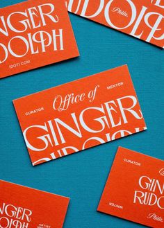 orange and white business cards with the words ginger dolph written on one side