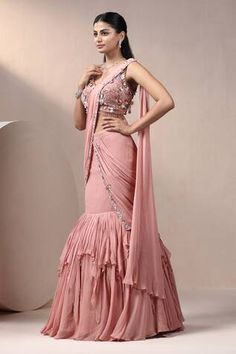 Peach attached cancan lehenga saree featuring layers, an attached drape with embroidered hem. Paired with a cutdana, sequin, stone embroidered, padded blouse. - Aza Fashions Cancan Lehenga, Peach Saree, Embroidered Hem, Padded Blouse, Lehenga Saree, Saree With Blouse, Sarees Online, Aza Fashion, Lehenga