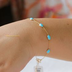 "Natural Turquoise Gemstone Bracelet, 18k Gold Bracelet, Gold Jewelry Bracelet, Gold Jewelry Bracelet, Turquoise Gemstone, Birthday Gifts  GEMSTONE DETAILS  ✦ Gemstone : Turquoise ✦ Gemstone Type : Natural ✦ Gemstone Shape : Oval ✦ Gemstone Color : Blue ✦ Gemstone Cut : Plain ✦ Number of Gemstones : 1 ✦ Gemstone Grade : Excellent ✦ Gemstone Weight : 0.55 CT METAL DETAILS  ✦ Metal : 18K Gold ✦ Metal Color : Yellow Gold/White Gold/Rose Gold ✦ Bracelet Size : 7.5\" ✦ Bracelet Weight : 1.4 Gram ✦ Bracelet Box: Yes CUSTOMISATION DETAILS  We can customize any piece of fine jewelry. You can simply message us on Etsy or drop a text at +91-7357229656 (WhatsApp/iMessage) to let us know about all the customization you want. Customization can include  ✦ The Gemstone: This ring can be made in Emerald, Fine Jewelry Turquoise Gemstone Bracelet, Turquoise Fine Jewelry Bracelets For Gift, Turquoise Gemstone Bracelets, Dainty Turquoise Gemstone Bracelets, Gold Jewelry Bracelet, 18k Gold Bracelet, Bracelet Box, Jewelry Bracelets Gold, Rose Gold Bracelet