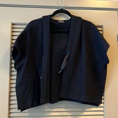 Anthropologie Cropped Short Sleeve Sweater. Navy. Tie In Front. Hood, Pockets And Slit On The Side. Never Worn. Navy Tie, Short Sleeve Sweater, Short Sleeved Sweaters, On The Side, Sleeve Sweater, Anthropologie, Color Blue, Sweaters For Women, Navy